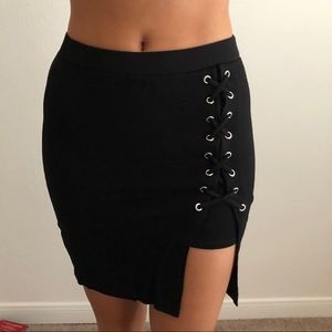 Black mini skirt with slit